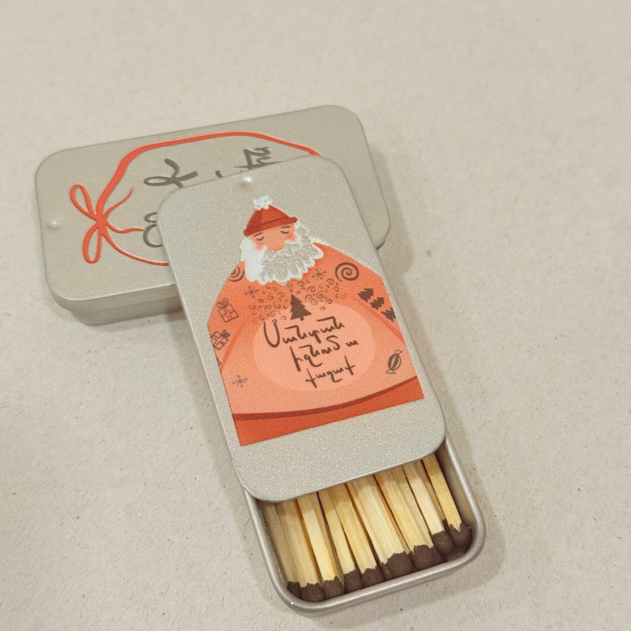 Candles in a metal container - Santa is coming